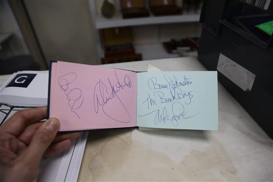 Five autograph albums and two albums of signed photos of 1980s-90s pop stars and celebrities
